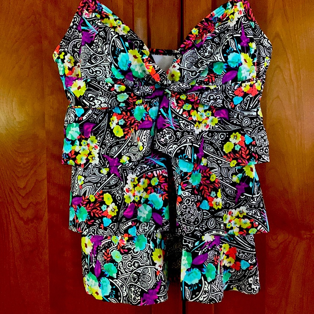 Lady’s swim top size Large in multi colors.